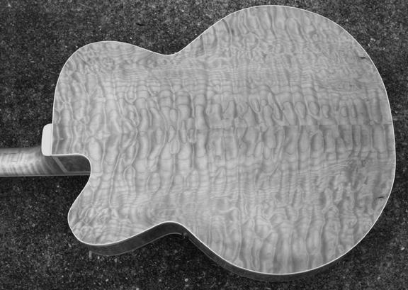 Aristocrat 1998 back-quilted maple bookmatched.jpg
